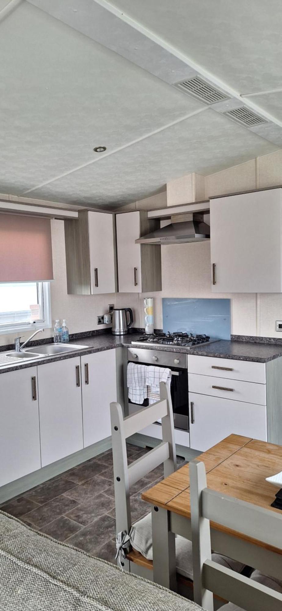 Sunset Retreat Caravan With Large Wrap Around Decking *